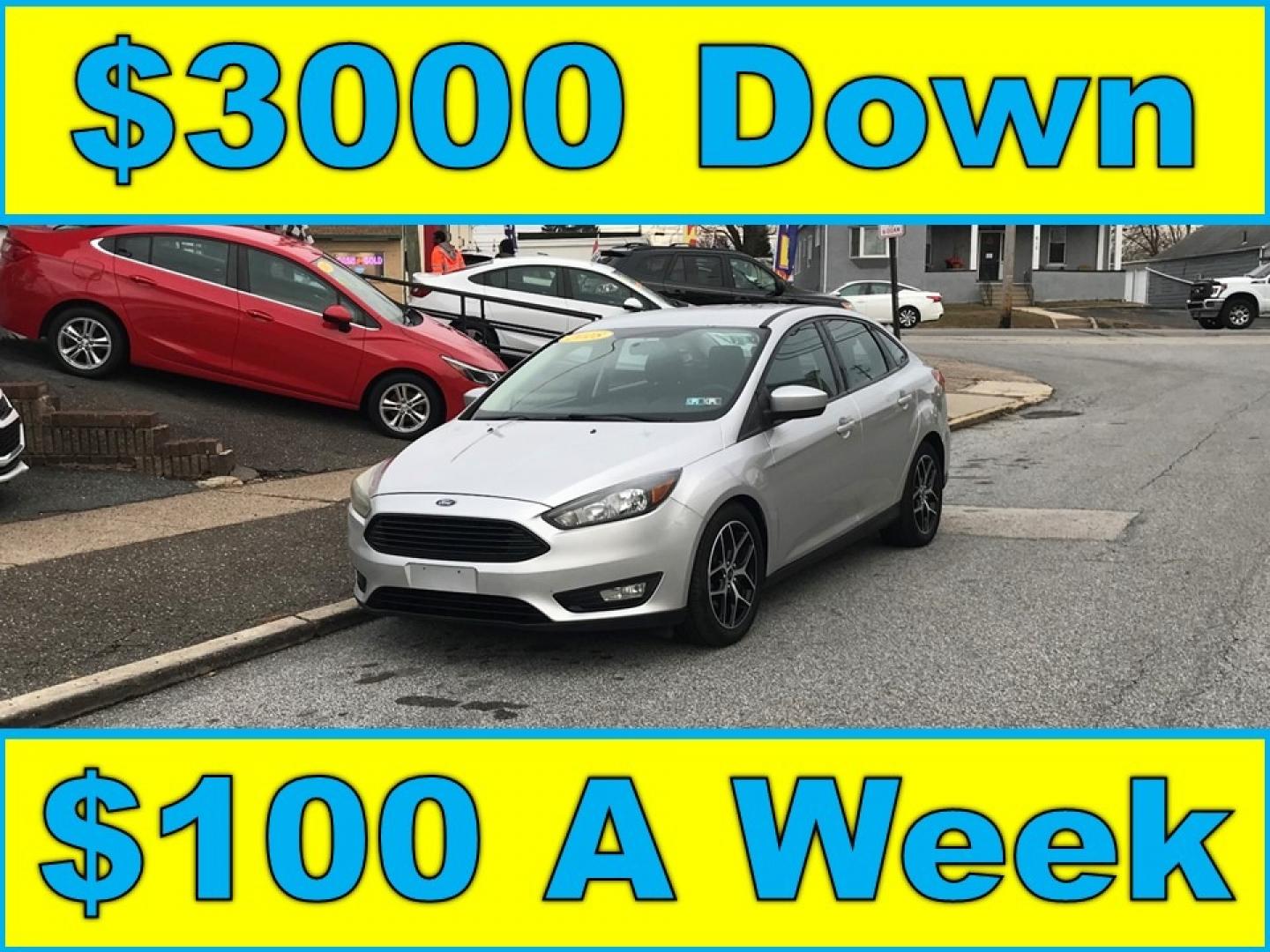 2018 Silver /Gray Ford Focus SE (1FADP3F24JL) with an 2.0 V4 engine, Automatic transmission, located at 577 Chester Pike, Prospect Park, PA, 19076, (610) 237-1015, 39.886154, -75.302338 - Photo#0